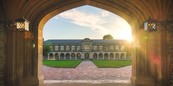 Ridgley Hall at sunset, viewed from the archway of Brookings Hall